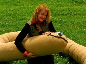 Melita Rowston and an artist Impression of a Giant Earthworm